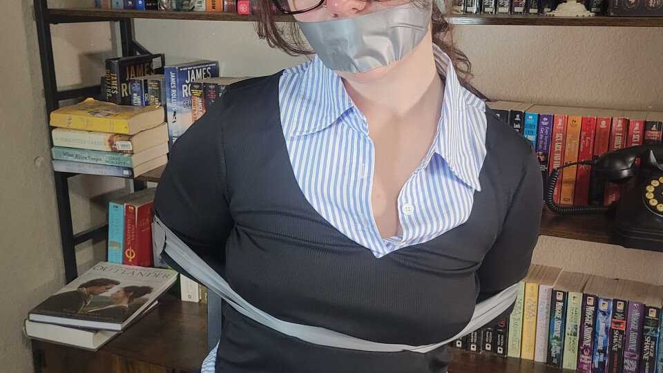 Stacey the bank employee tied up in tape